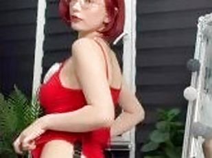 Cute redhead dancing in Christmas outfit