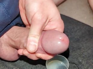 Extreme close up, huge thick load of cum transferred into a cup and swallowed