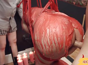 red bondage, wax and BDSM threesome