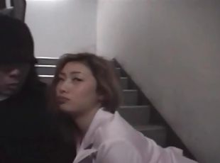 Asian sucks off a dick in the stairwell