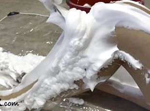 My nude body is covered in foam, then slowly, bit by bit I use an ice scraper to remove the foam