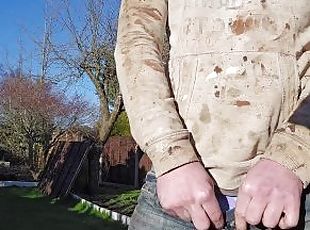 Pissing outdoor wearing dirty clothes